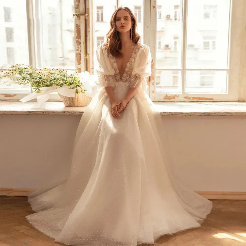 Sexy Half Puff Sleeve A-Line Boho Wedding Dress Luxury Illusion V Neck Appliques Pearls Bridal Gown