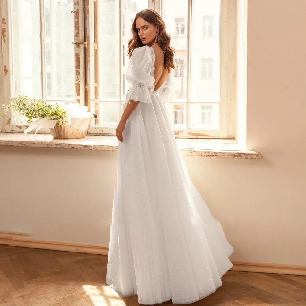 Sexy Half Puff Sleeve A-Line Boho Wedding Dress Luxury Illusion V Neck Appliques Pearls Bridal Gown